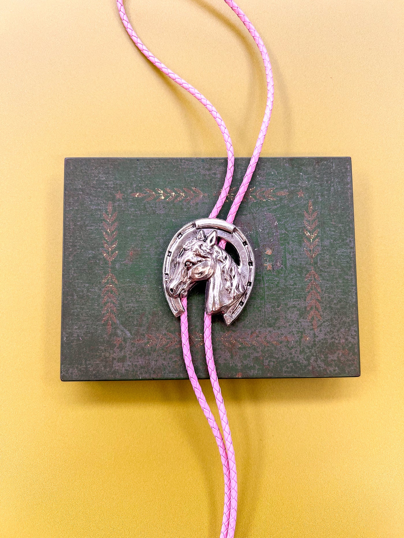 Lucky Horse Pink Braided Leather Bolo Tie