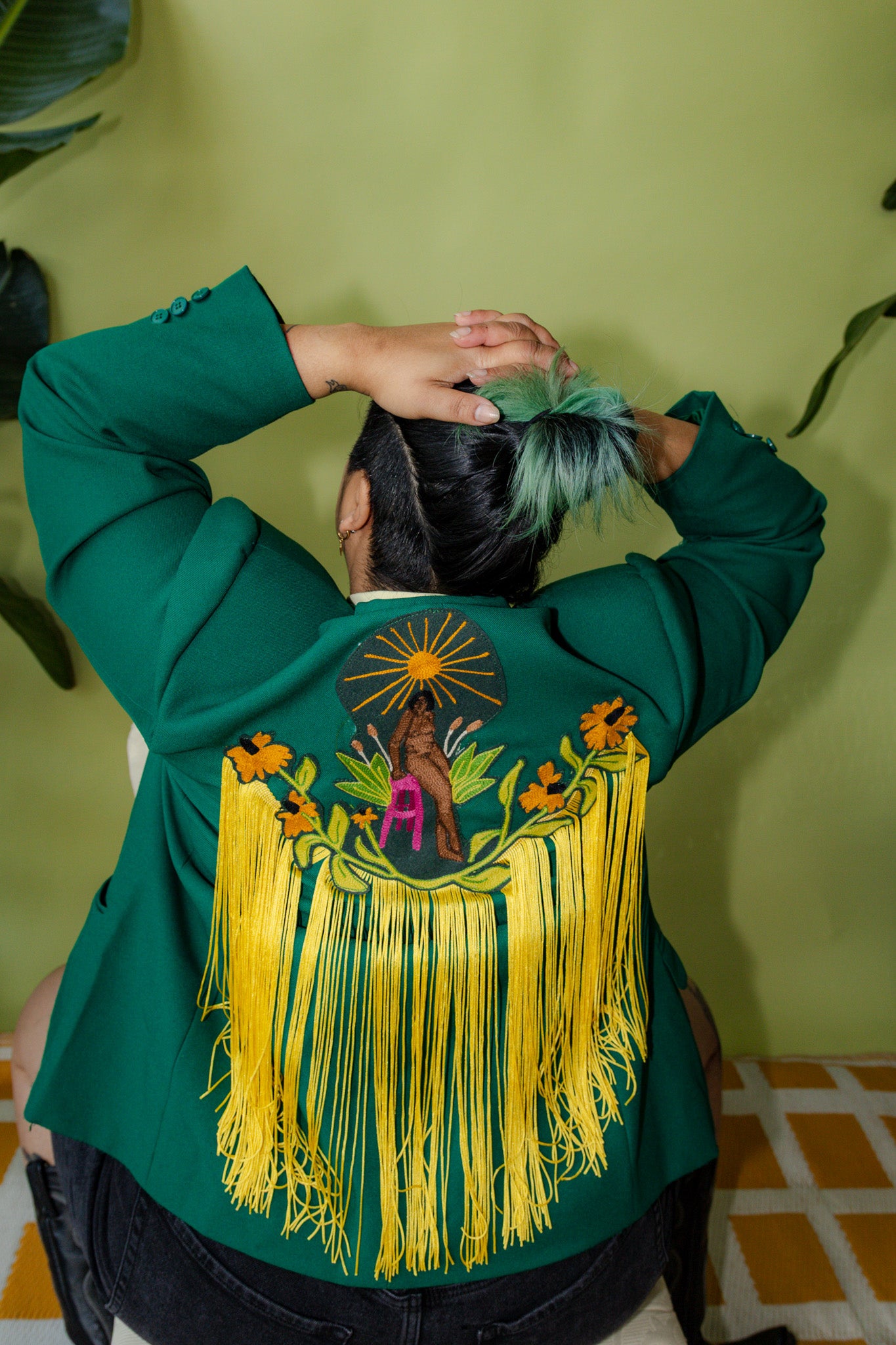Sitting Woman Long Fringe Chain Stitch Green Blazer